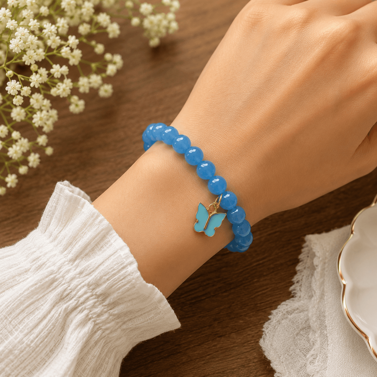 Artisan Blue Jelly Bead & Butterfly Charm Stretch Bracelet | Handmade Jewelry